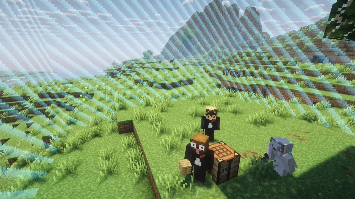 Drei Minecraft-Figuren stehen an einer Werkbank innerhalb der blauen Weltgrenze.