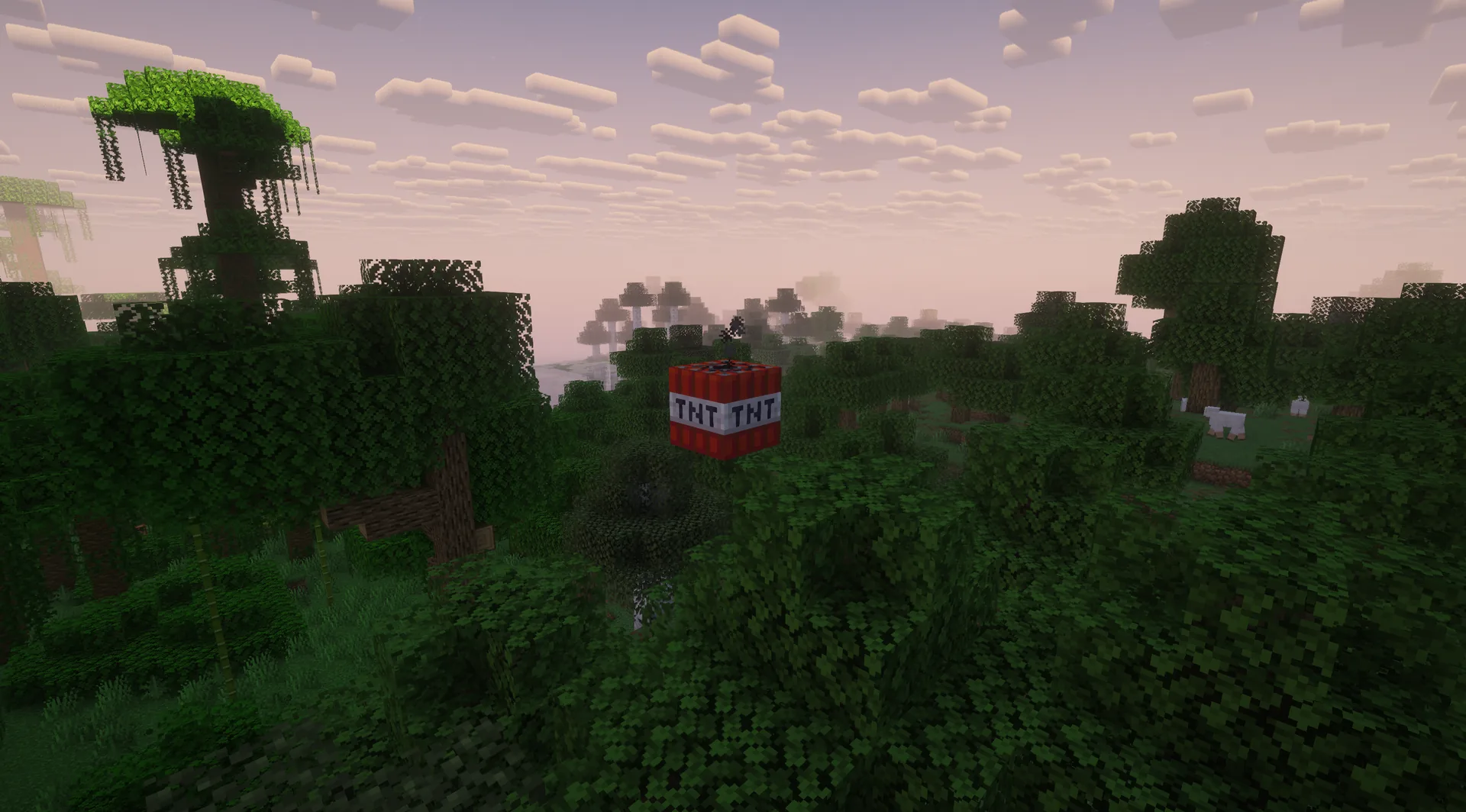 Primed TNT hangs in midair with a puff of smoke above forest treetops at dusk.